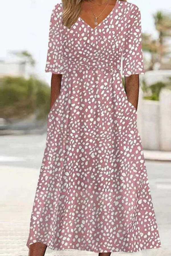 Camille | Robe midi élégante à pois qui aplatit le ventre
